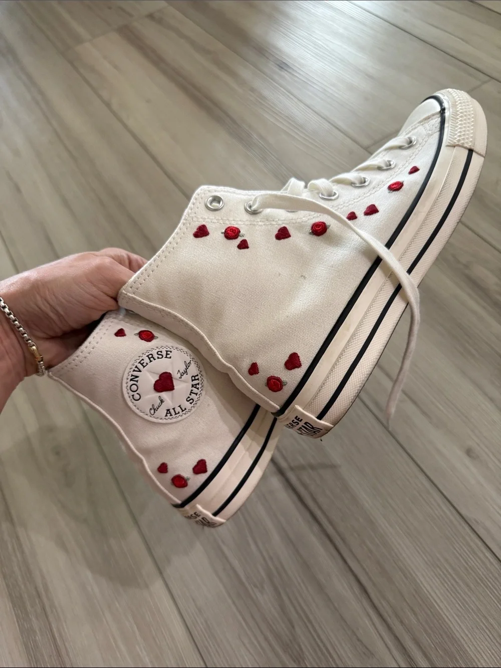 White High-Top Converse Sneakers with Red Heart Accents